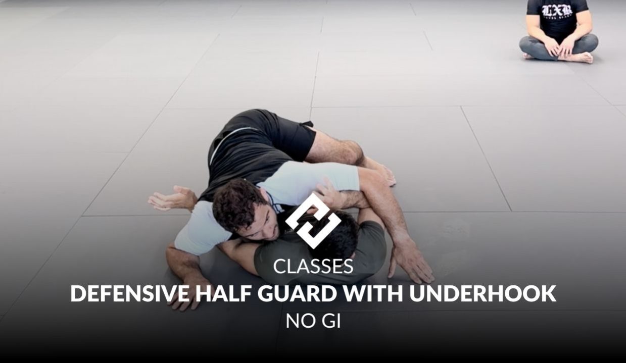 DEFENSIVE HALF GUARD WITH UNDERHOOK.jpg